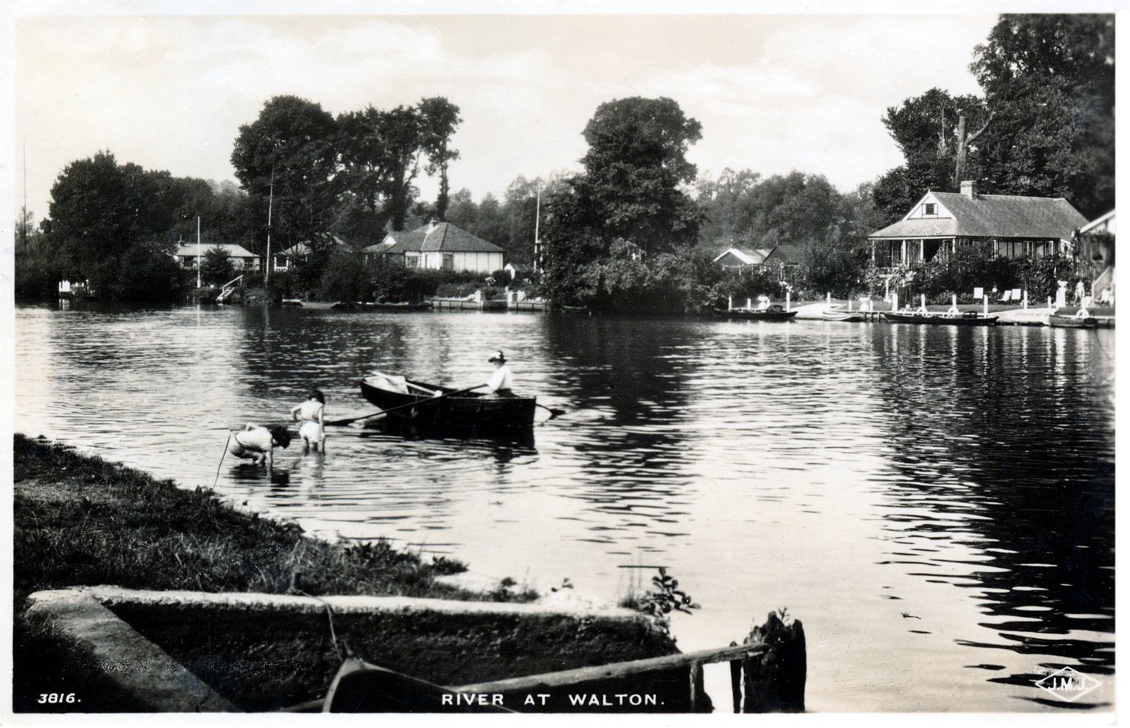 Walton,bungalows,children paddling,river view